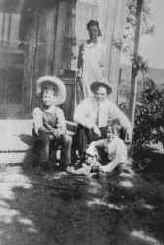 Woody Guthrie, George, Nora on Porch of Okemah Home